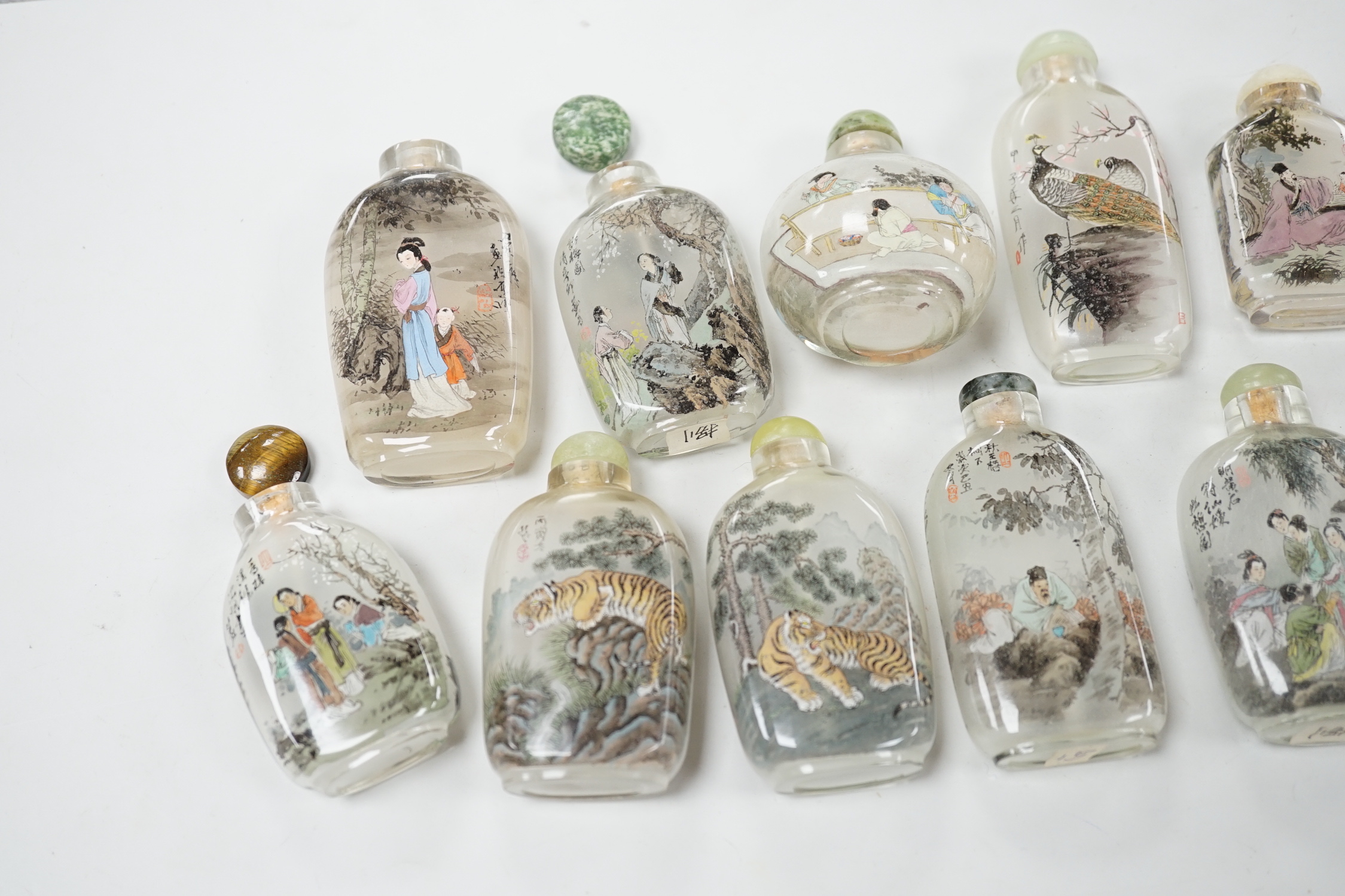 A small collection of Chinese reverse painted bottles